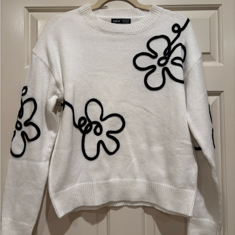 SHEIN White Sweater with Black Floral Accents